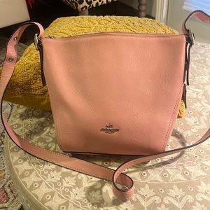 Coach in light pink leather